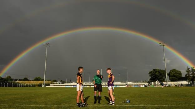 Referee Thomas Gleeson with Kilkenny captain Harry Shine and Wexford captain Luke Murphy during the coin toss before the 2021 Electric Ireland Leinster Minor Hurling Championship Final match between Kilkenny and Wexford at Netwatch Cullen Park in Carlow. 