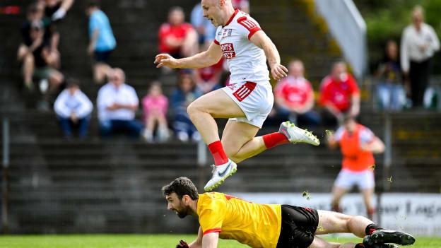 Brian O'Driscoll of Cork jumps over Louth goalkeeper James Califf after scoring his side's first goal during the GAA Football All-Ireland Senior Championship Round 1 match between Louth and Cork at Páirc Tailteann in Navan, Meath. Photo by Seb Daly/Sportsfile