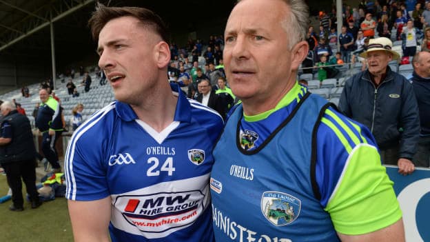 Gary Walsh and Mick Lillis celebrate.