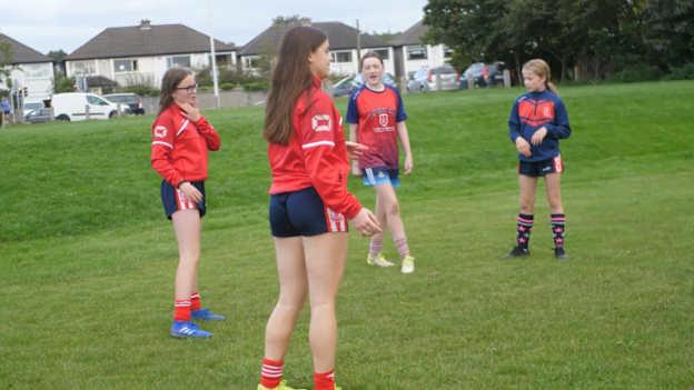 Aisling Nig Ruairc pictured mentoring younger girls in her club Cuala. 