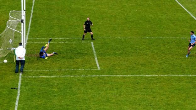 Cormac Costello slots home a first half penalty for the game's only goal. 