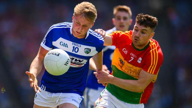 Alan Farrell, Laois, and Ciaran Moran, Carlow, in action at Croke Park.