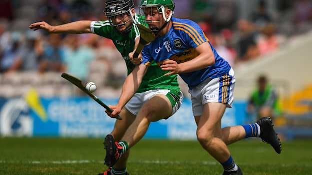 James Devaney of Tipperary in action against Padraig Harnett of Limerick during the Electric Ireland Munster GAA Hurling Minor Championship Final.