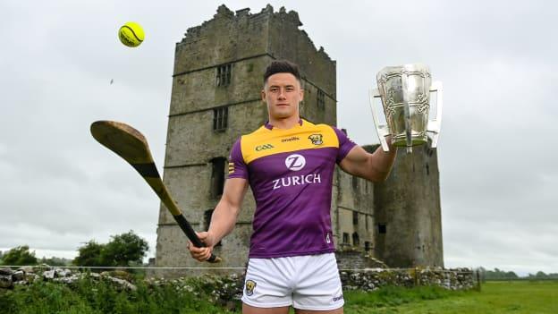 Lee Chin of Wexford poses for a portrait with the Liam MacCarthy Cup at Loughmore Castle at the GAA Hurling All-Ireland Senior Championship Series national launch in Tipperary.