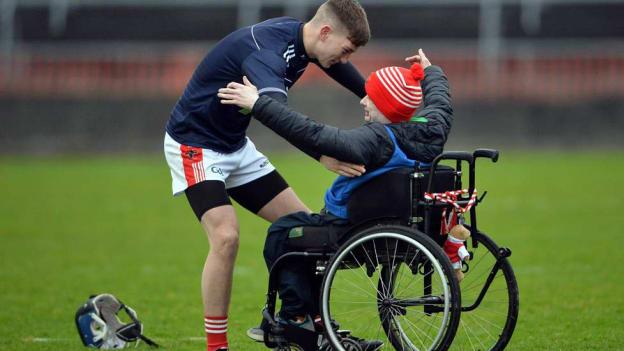 Tuam Herald photographer, Ray Ryan, won the MacNamee Award for Best Photograph for this photo of Carnmore goalkeeper Torin Finnerty embracing Dylan McLoughlin, a member of the management team, after they won their first ever Galway County Minor A Hurling Championship. 