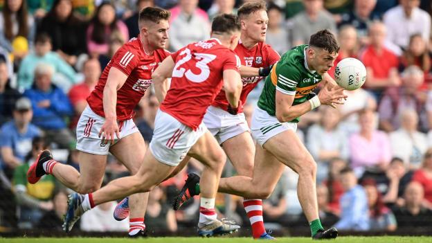 David Clifford of Kerry in action against Cork players, from left, Kevin Flahive, Sean Powter and Steven Sherlock during the Munster GAA Football Senior Championship Semi-Final match between Cork and Kerry at Páirc Ui Rinn in Cork. 
