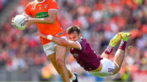 Stefan Campbell of Armagh is tackled by Cillian McDaid of Galway during the 2022 GAA Football All-Ireland Senior Championship Quarter-Final match between Armagh and Galway at Croke Park, Dublin. Photo by Ray McManus/Sportsfile