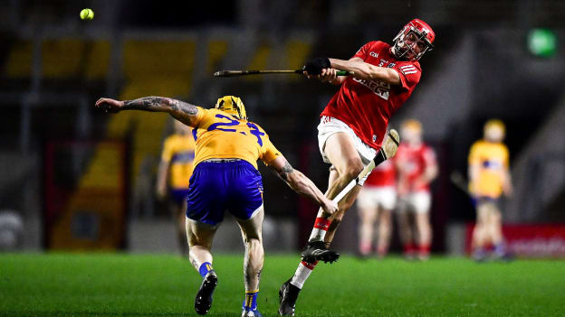 Ciaran Joyce, Cork, and Aaron Fitzgerald, Clare, during the Allianz Hurling League clash at Páirc Uí Chaoimh.