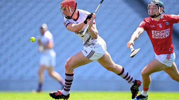 Conor Whelan of Galway scores his side's first goal despite the efforts of Mark Coleman of Cork during the Allianz Hurling League Division 1 Group A Round 5 match between Cork and Galway at Páirc Ui Chaoimh in Cork.