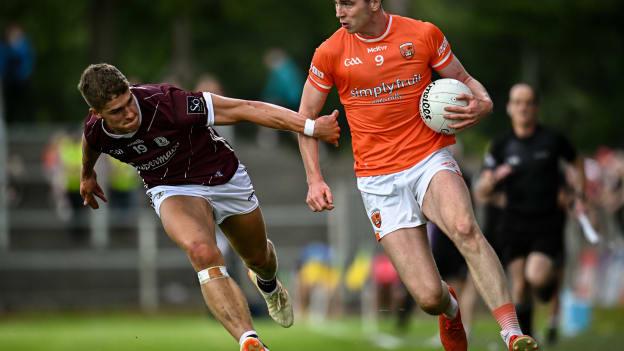 Ben Crealey, Armagh, and Billy Mannion, Galway, in All-Ireland SFC action. Photo by Harry Murphy/Sportsfile