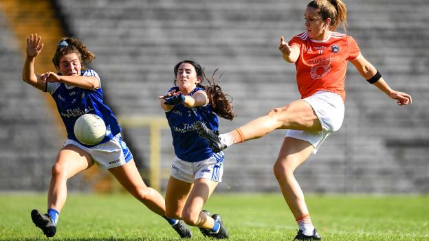 Caroline O Hanlon of Armagh shoots to score her side's first goal despite the attentions of Shauna Lynch, left, and Racheal Doonan of Cavan during the TG4 All-Ireland Senior Ladies Football Championship Group 2 Round 2 match between Armagh and Cavan at St Tiernach's Park in Monaghan. 