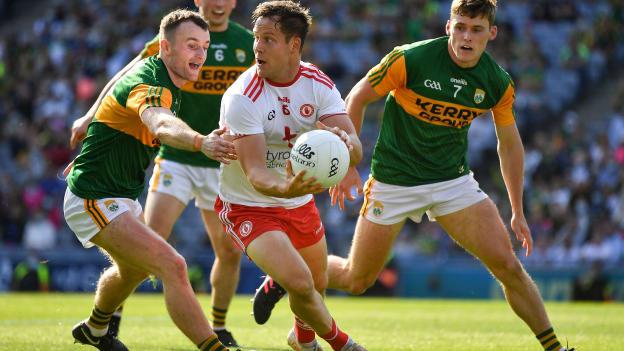 Kieran McGeary of Tyrone in action against Tom O'Sullivan, left, Paul Murphy, 6, and Gavin White of Kerry during the GAA Football All-Ireland Senior Championship semi-final match between Kerry and Tyrone at Croke Park in Dublin.