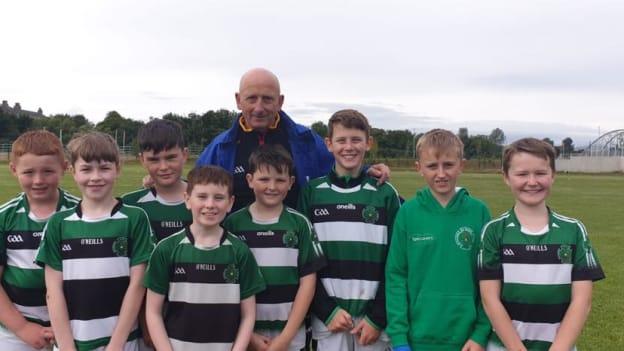 Na Magha juvenile hurlers pictured with the GAA's National Hurling Development Manager, Martin Fogarty. 