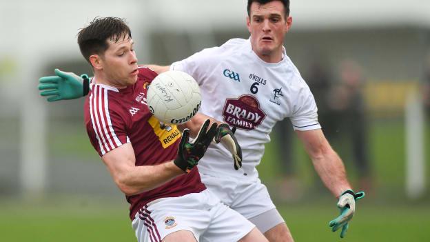Callum McCormack, Westmeath, and Eoin Doyle, Kildare, collide at The Downs GAA Club.