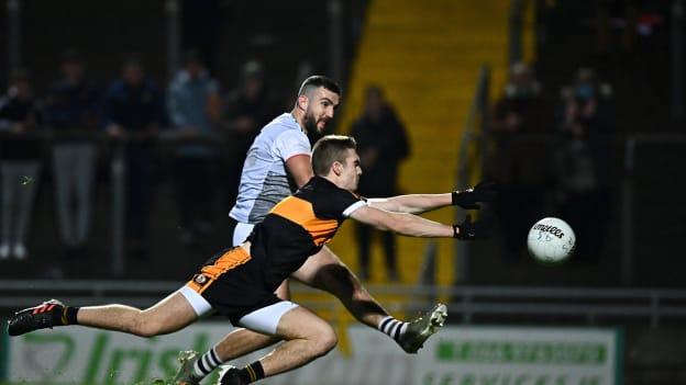 Daithí Griffin of St Brendans has a shot on goal despite the efforts of Dylan Casey of Austin Stacks during the Kerry County Senior Football Championship Semi-Final match between Austin Stacks and St Brendan's at Austin Stack Park in Tralee, Kerry.