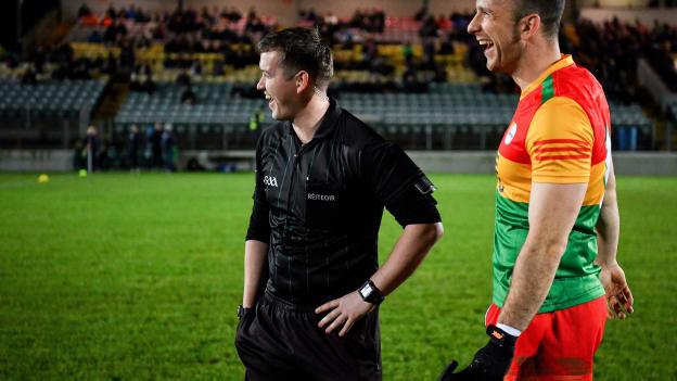 Referee Darragh Byrne with the Carlow captain Darragh Foley as they await the arrival of the Meath captain before the 2023 O'Byrne Cup Group B Round 1 match between Carlow and Meath at Netwatch Cullen Park in Carlow. 