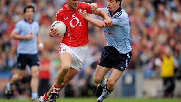 Pearse O'Neill, Cork, in action against Kevin Nolan, Dublin, in the 2011 Allianz Football League Final. 