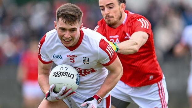 Luke Fahy, Cork, and Oisín McGuinness, Louth, during the Allianz Football League Division 2 match between Louth and Cork at Páirc Mhuire in Ardee, Louth. Photo by Stephen Marken/Sportsfile