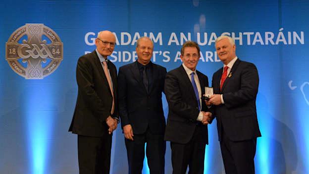 Professor Niall Moyna, DCU, second from right, is presented with his Education Award, by from left, Denis O’Callaghan, Head of Retail Banking, AIB, Ardstiúrthóir TG4, Alan Esslemont, and Uachtarán Chumann Lúthchleas Gael Aogán Ó Fearghail.