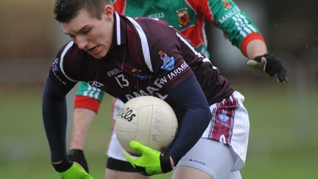 Kieran Martin, Westmeath, and Kevin McLoughlin, Mayo, in Allianz Football League action in 2009. Photo by Ray Ryan/Sportsfile