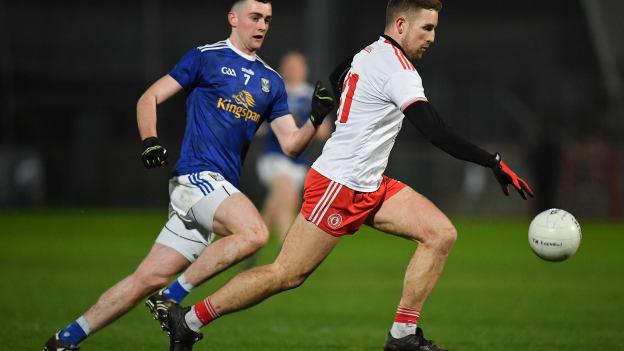 Niall Sludden, Tyrone, and Conor Rehill, Cavan, during an Allianz Football League clash last March.