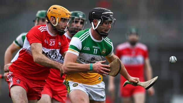 Jason Sampson of Offaly under pressure from Derry's Patrick Turner the last time the sides met in the Christy Ring Cup in 2020