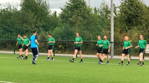 The officials involved in the All Ireland football finals warming up ahead of a session at the GAA Games Development Centre in Abbotstown on Tuesday evening.