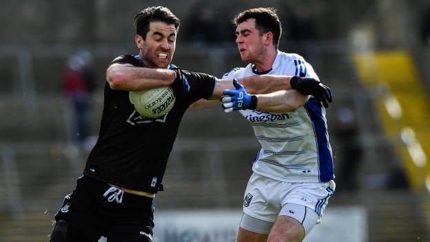 Michael Darragh MacAuley, Dublin, and Conor Rehill, Cavan, in Allianz Football League action at Kingspan Breffni.