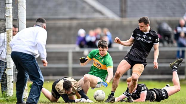 Donal Casey of Leitrim in action against Sligo players, Eddie McGuinness, Evan Lyons and goalkeeper Daniel Lyons during this afternoon's Allianz Football League match at Avant Money Páirc Seán Mac Diarmada. 