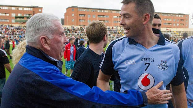 Former Dublin manager Michael O'Grady congratulates Michael Carton after Dublin's 2013 Leinster SHC semi-final replay victory over Kilkenny.