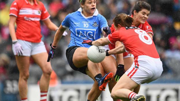 Noelle Healy of Dublin has her shot blocked down by Marie Ambrose and Rena Buckley of Cork during the 2016 Ladies Football All-Ireland Senior Football Championship Final.