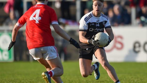 Jerome Johnston on the ball for Kilcoo during the 2019 AIB Ulster Club Senior Football Championship.