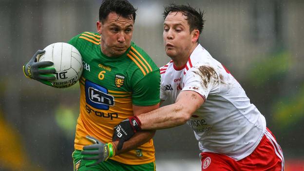 Paul Brennan of Donegal in action against Kieran McGeary of Tyrone during the Ulster GAA Football Senior Championship Quarter-Final match between Donegal and Tyrone at Pairc MacCumhaill in Ballybofey, Donegal.