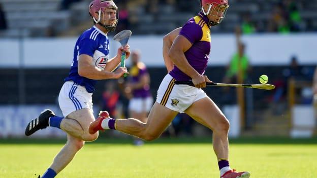 Lee Chin, Wexford, and Ciaran Collier, Laois, in Leinster SHC action at UPMC Nowlan Park.