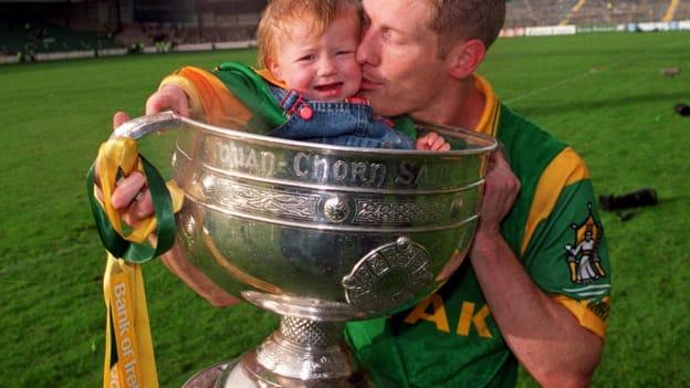 Meath Captain Graham Geraghty celebrates with his daughter Sophia and the Sam Maguire cup following Meath's victory over Cork in the 1999 All-Ireland SFC Final. 