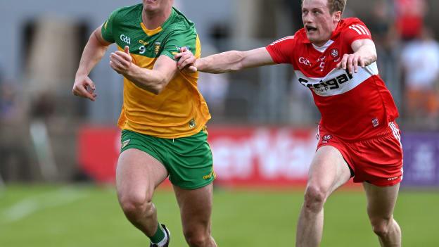 Jason McGee, Donegal, and Brendan Rogers, Derry, in All-Ireland SFC action. Photo by Brendan Moran/Sportsfile