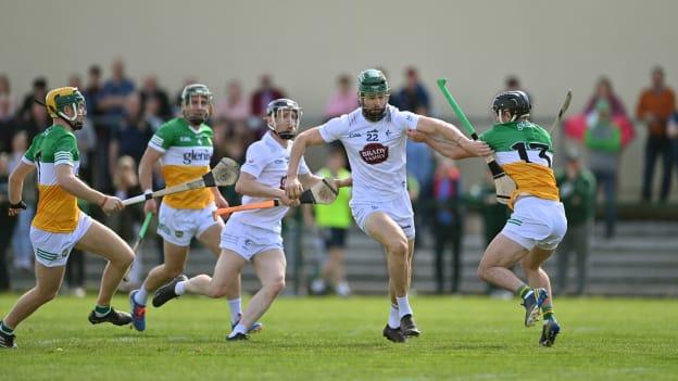 Harry Carroll, Kildare, and David Nally, Offaly, in Joe McDonagh Cup action. Photo by Stephen Marken/Sportsfile
