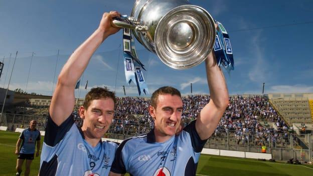 Dublin's Joy Boland, left, and Peter Kelly celebrate with the Bob O'Keeffe Cup after victory over Galway in the 2013 Leinster SHC Final. 