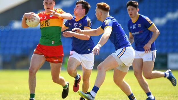 Jordan Morrissey of Carlow in action against Aaron Farrell and Ryan Moffett of Longford during the Tailteann Cup Group 3 Round 3 match between Longford and Carlow at Laois Hire O'Moore Park in Portlaoise, Laois. Photo by Matt Browne/Sportsfile.