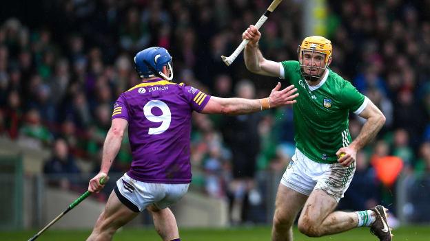 Richie English, Limerick, and Kevin Foley, Wexford, in Allianz Hurling League action. Photo by Tyler Miller/Sportsfile