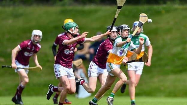 Dylan Gath-Hollywood of Offaly in action against Conor Daly and Dylan Drake of Westmeath during the Electric Ireland Challenge Corn Jerome O'Leary Final match between Westmeath and Offaly. 