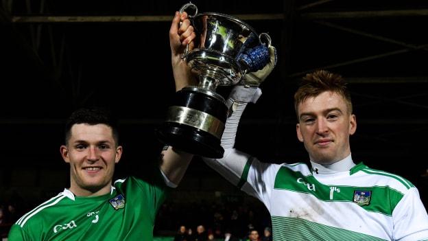 Limerick joint captains Iain Corbett, left, and Donal O'Sullivan lift the cup after the McGrath Cup Final match between Cork and Limerick at LIT Gaelic Grounds in Limerick. 