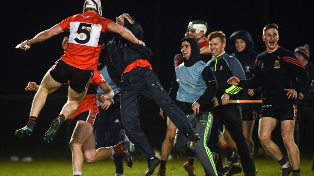 Chris O'Leary is congratulated by UCC substitutes and supporters following a dramatic Electric Ireland Fitzgibbon Cup semi-final victory.