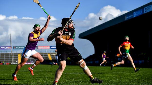 Damien Jordan, Carlow, and Conor McDonald, Wexford, in Allianz Hurling League action at Chadwicks Wexford Park.