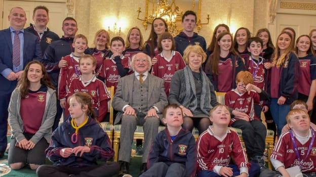 The Raheny All-Stars pictured at Áras an Uachtarain with President Michael D. Higgins and his wife Sabina.