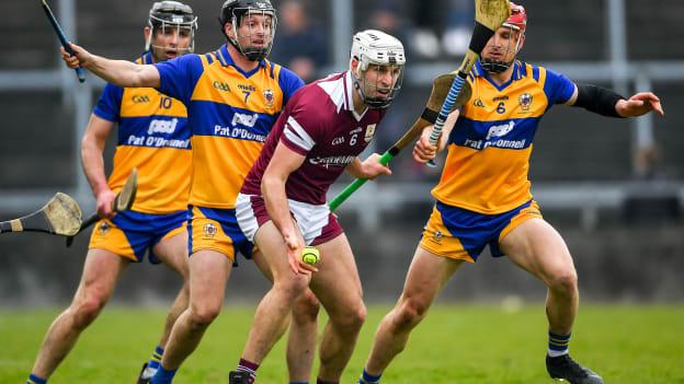 Gearoid McInerney of Galway in action against Jack Browne and John Conlon of Clare during the Allianz Hurling League Division 1 Group A match between Galway and Clare at Pearse Stadium in Galway.