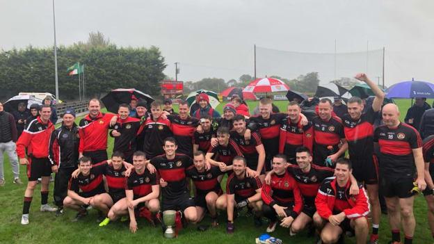 The Dreadnots team celebrate together after defeating Naomh Mairtin in the Louth Junior 2B Football Championship Final. 