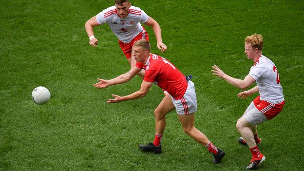 Cork's Sean White surrounded by Tyrone's Brian Kennedy and Hugh Pat McGeary at Croke Park.