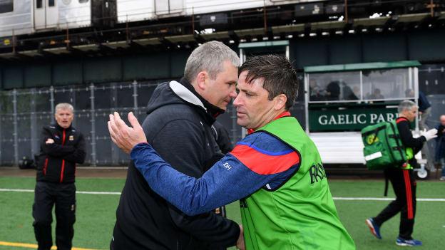 James Horan and Justin O'Halloran embrace following Mayo's win over New York at Gaelic Park on Sunday.