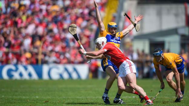 Patrick Horgan, Cork, and Seadna Morey, Clare, collide during the 2018 Munster SHC Final at Semple Stadium.